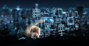 Businessman,On,Blurred,Background,Using,Tech,Devices,And,Icons,Thin strategies to empower your hybrid workforce